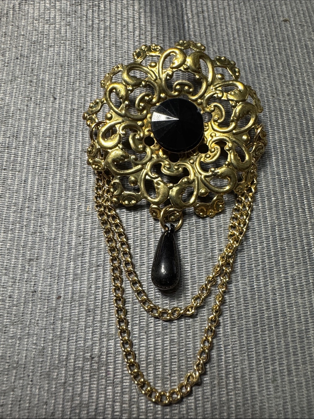 Vintage Source Unknown Gold-tone Filigree Brooch with Black Stone and Teardrop